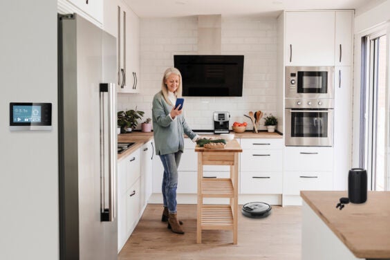 person in kitchen using various lifestyle products