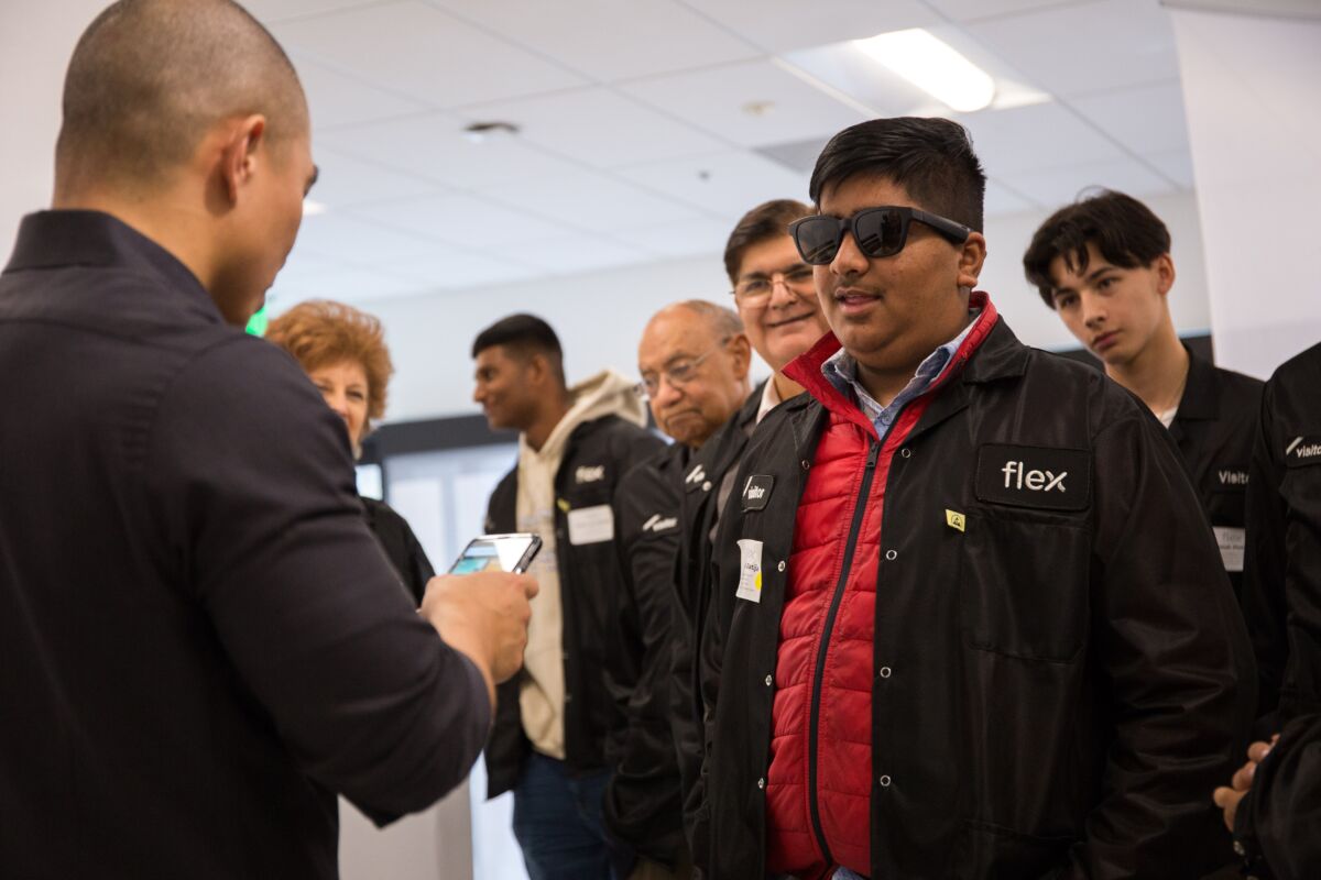 Flex employee and guests on Manufacturing Day