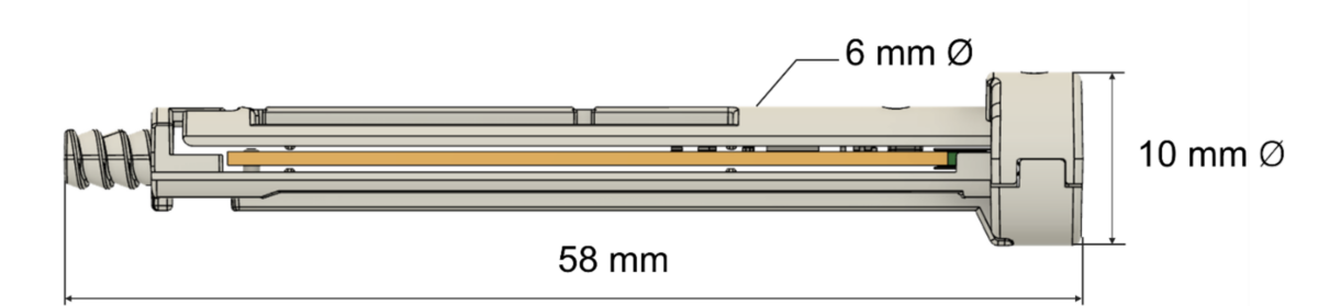 image of a circuit board and a coin-cell battery